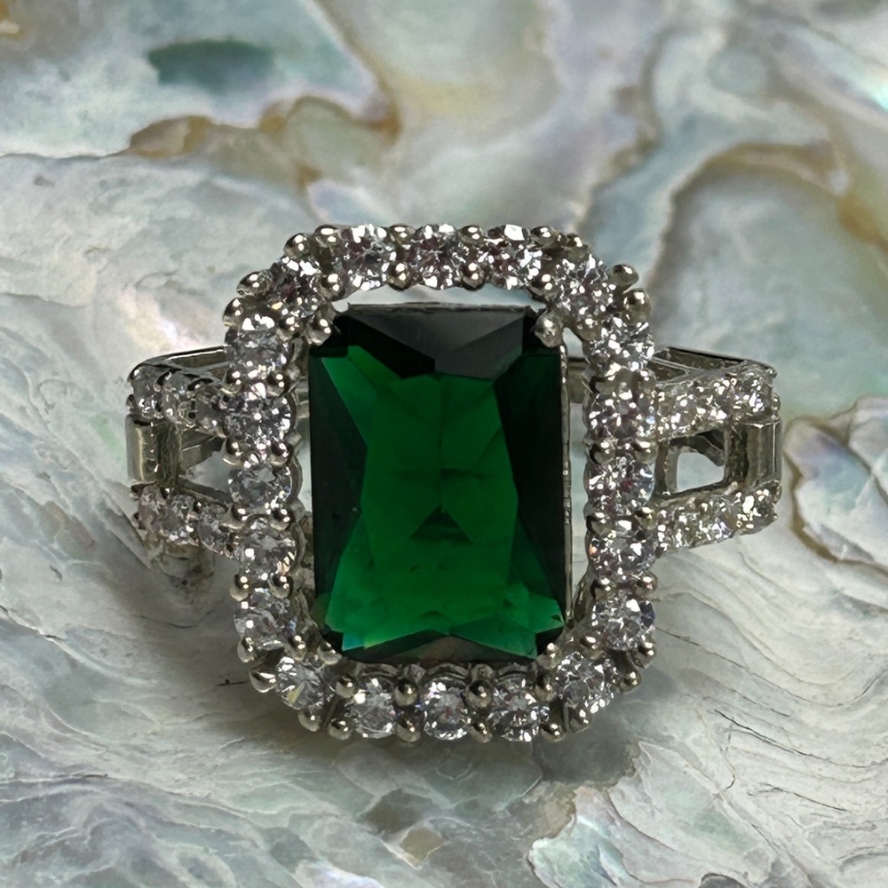 Sterling silver large lab created emerald and white sapphire ring